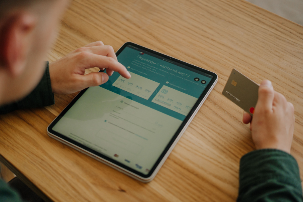 Field representative using a tablet to securely access central banking systems on location
