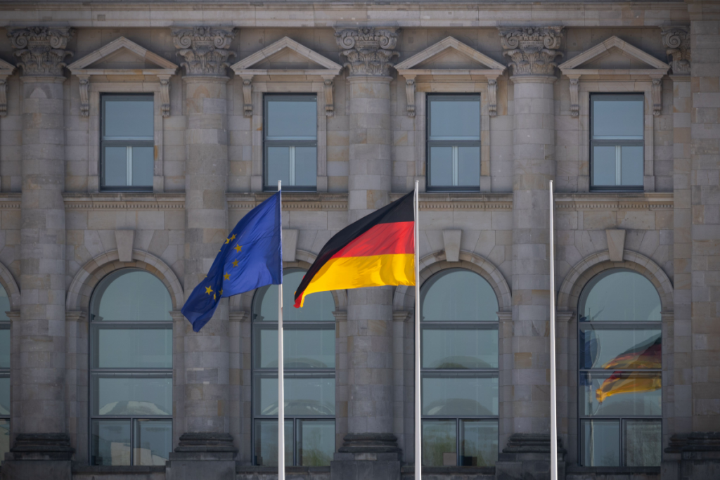 Government building with EU and national flags representing public sector operations